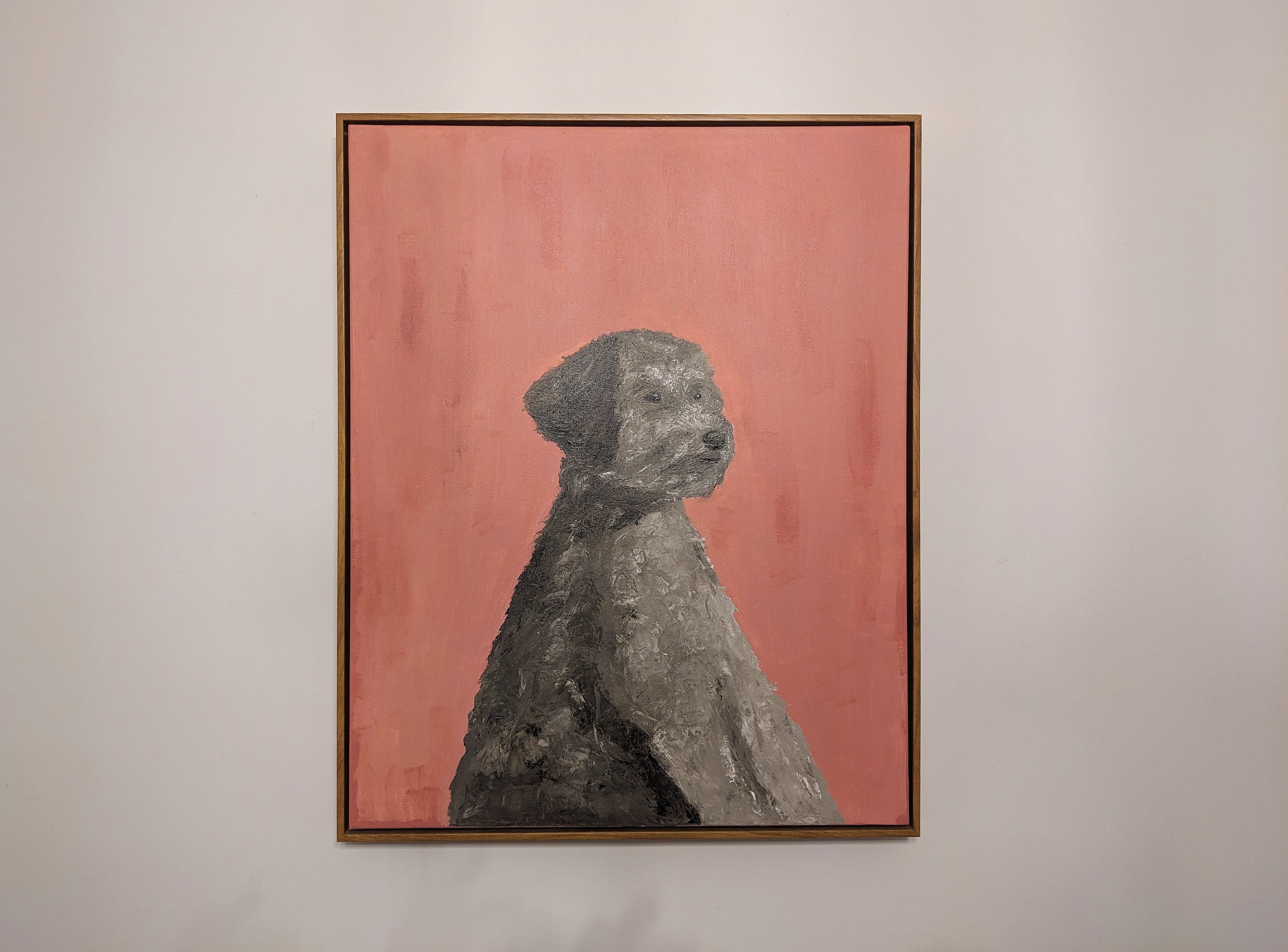 A painting of a portrait of a dog sitting in a regal manner.