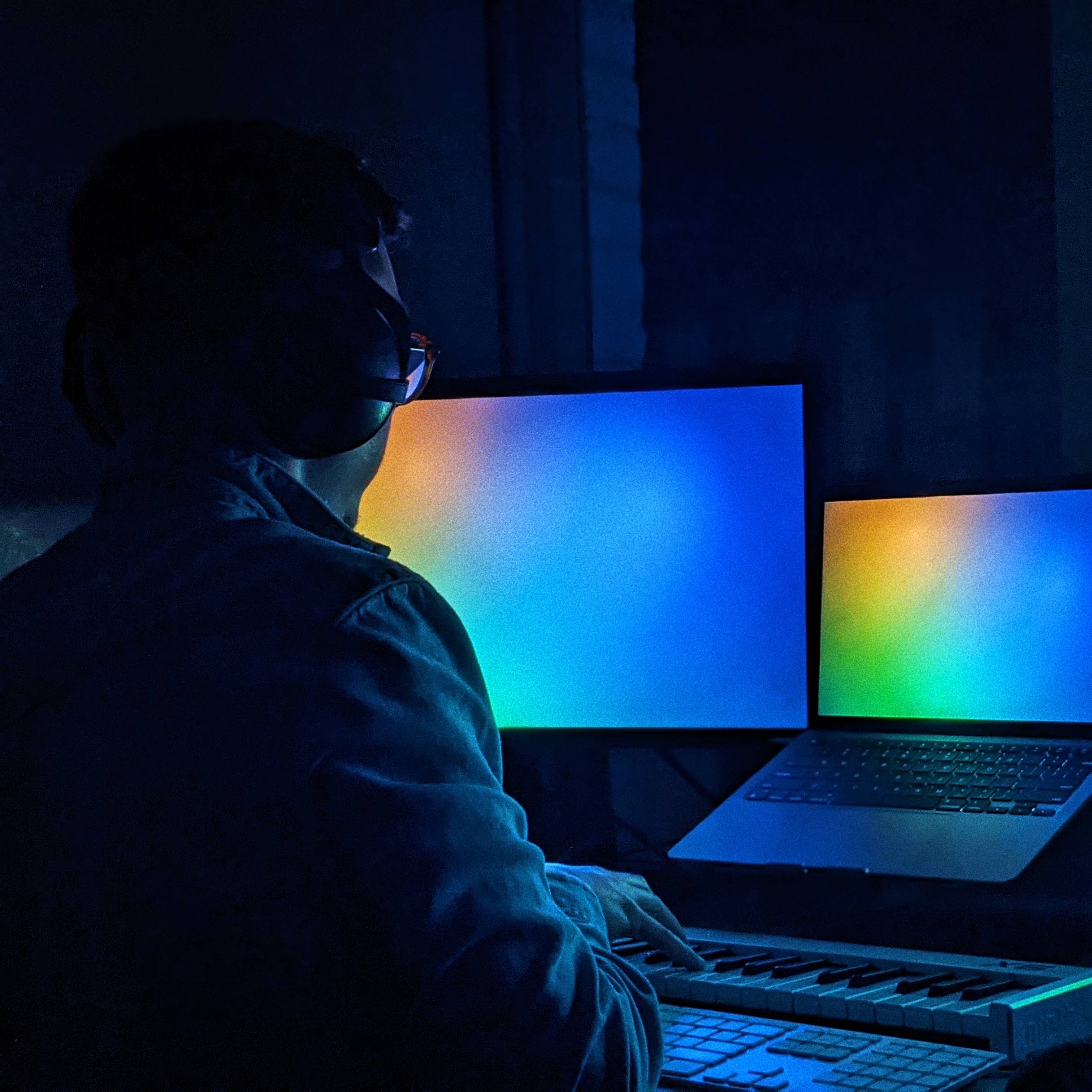 Self-portrait photograph playing music to Sound Color visuals